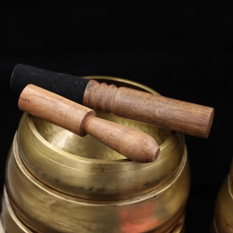 Tibetan brass singing bowl with Sanskrit – handmade meditation instrument for stress relief.