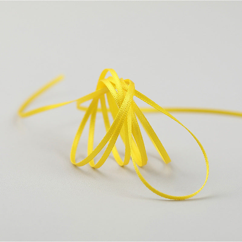 DIY Gift Ribbon Bookmark Hair Tie from QuestCrate